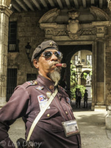 Cuba,Cigar-smoking official, old Havana, historical district. Havana