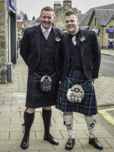 In Pitlochry, manly Scots in full Scottish Highland dress
