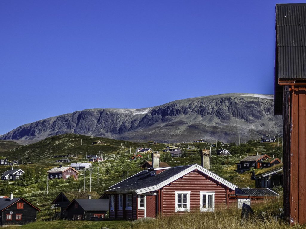 The settlement of Ustaoset with the flat-top mountains of Hallingskarvet National Park in the background,Oslo to Bergen by Train, Norway by Train