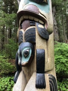 Detail of a 1982 recreation of a crest pole depicting heraldic emblems of the Yaadaas clan of Kaigani Haida, Alaska