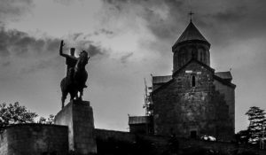 Statue of King Vakhtang Gorgasali, the founder of Tbilisi, and Metekhi Church, T'bilisi, Republic of Georgia