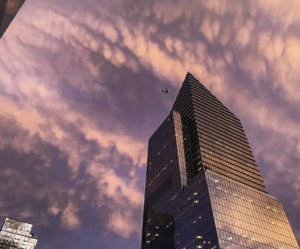 Futuristic asymmetrical skyscrapers at sunset, New York City