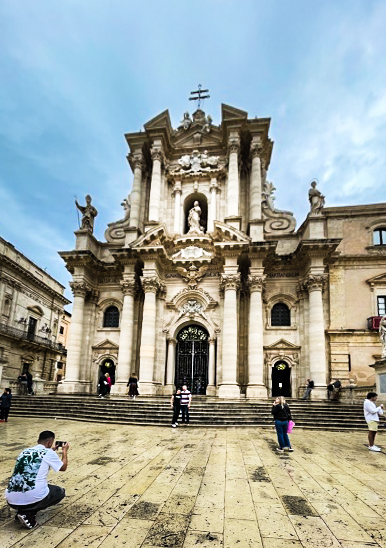 Baroque facade of the Cathedral, which incorporates the Temple of Minverva in Ortygia, Syracuse, Sicily, Italy