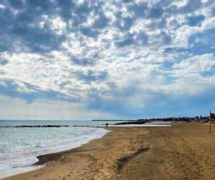 Mediterranean Sea after a storm, the beach at Agrigento, Sicily, Italy