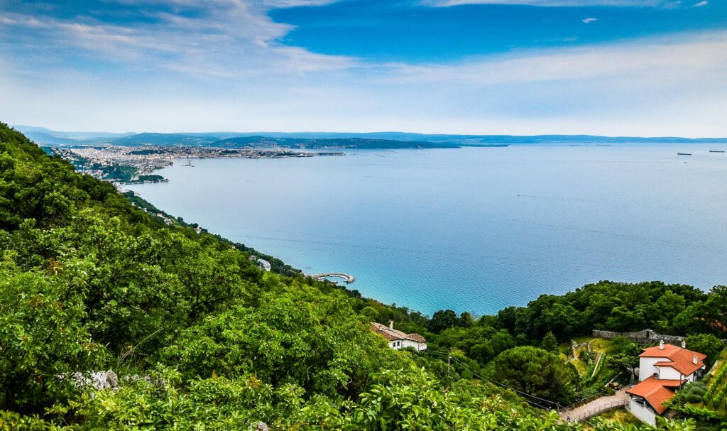 The Adriatic Sea from Prosecco, with three countries in one view. Trieste, Italy, is on the very left. The coast then continues to Slovenia, and, on the horizon, to Croatia. 
