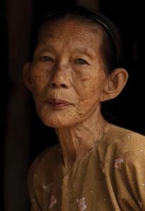 Poignantly beautiful older woman, Hoi An, Vietnam
