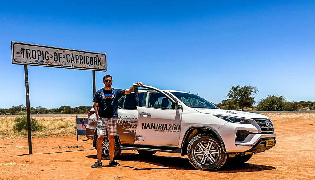 The author at the Tropic of Capricorn, Namibia, Africa