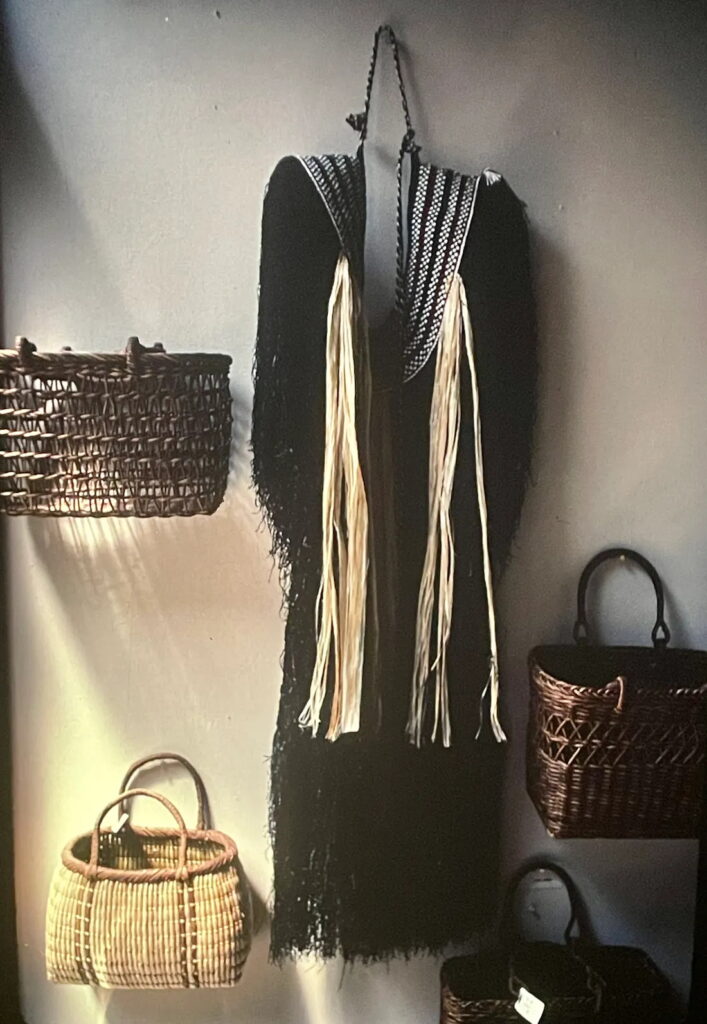 Raincape and baskets displayed at a shop in Morioka, Tohoku, Honshu, Japan.